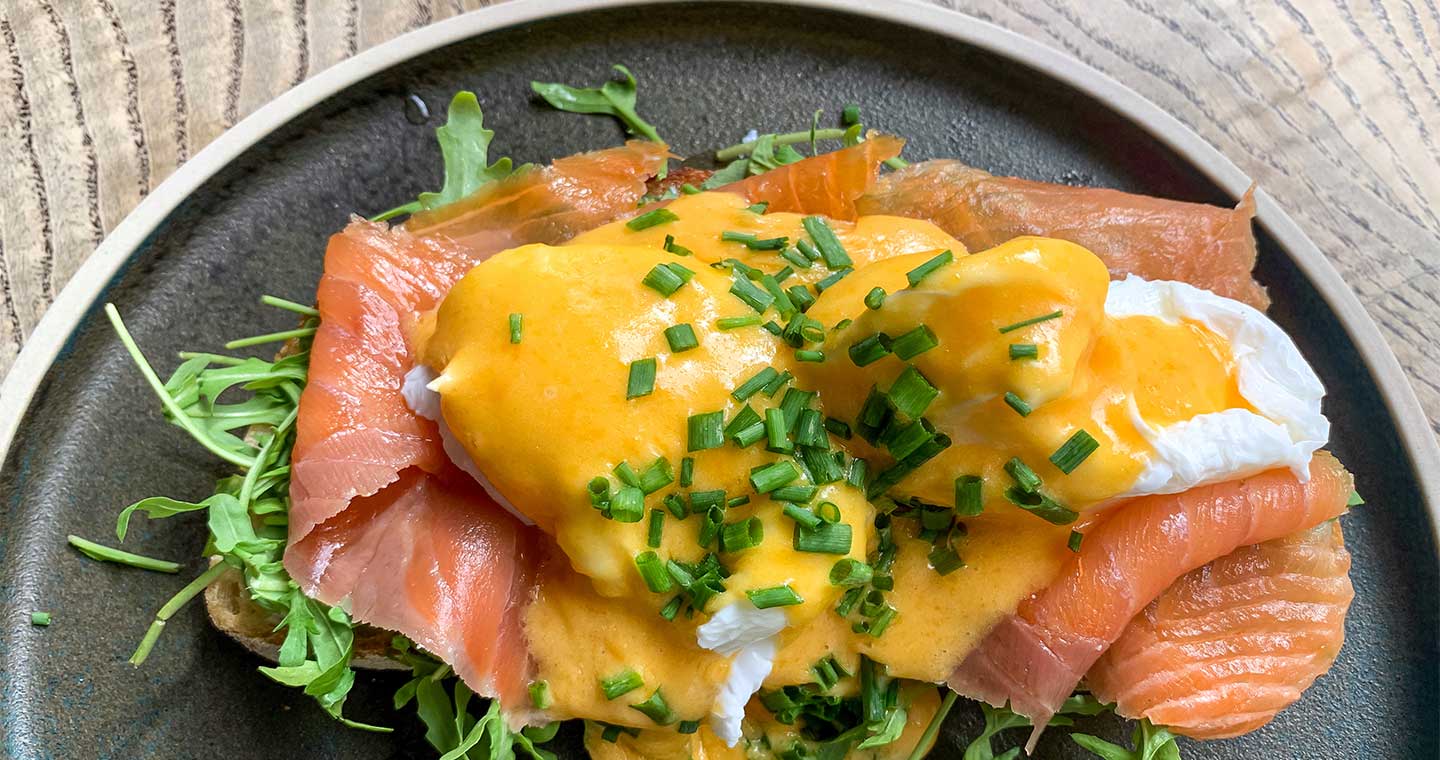 Deep Ellum food, Eggs benedict with smoked salmon rocket on toast.